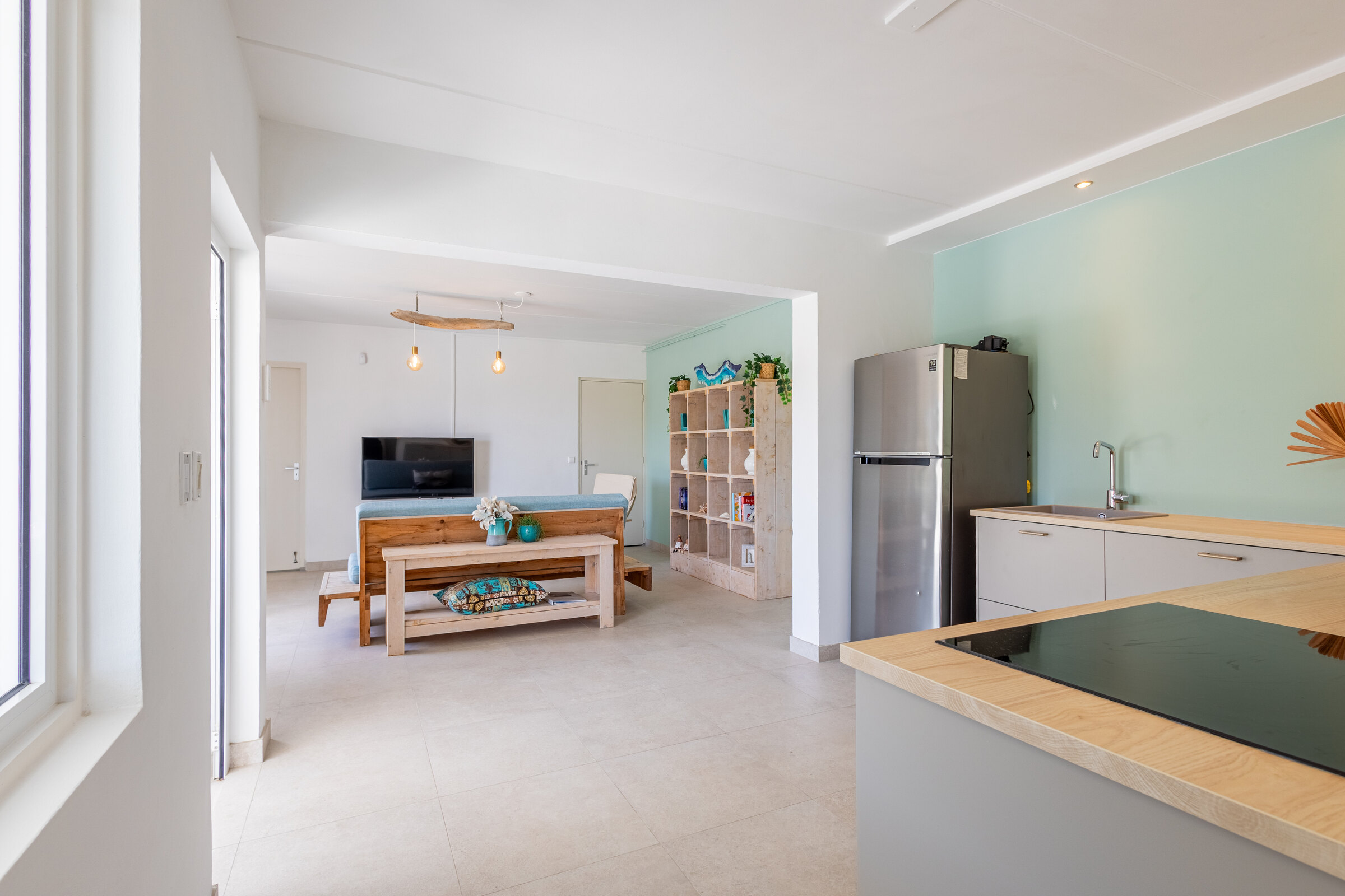 Woonkamer en keuken van Appartement Out of the Blue